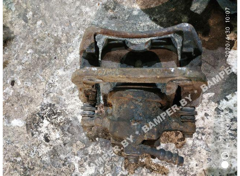 Суппорт передний левый к Opel Corsa, 2004г.