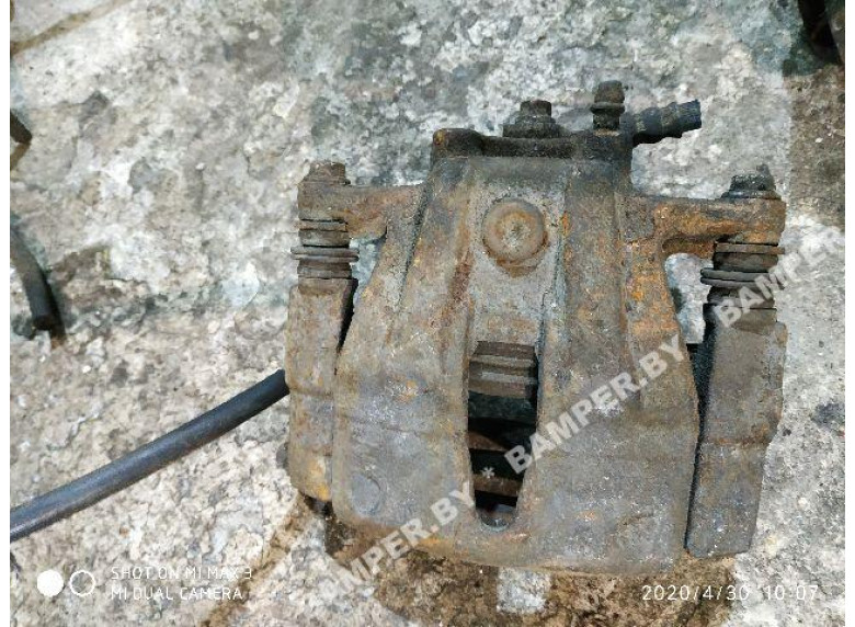 Суппорт передний левый к Opel Corsa, 2004г.