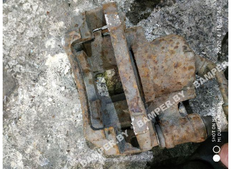 Суппорт передний правый к Ford Escort, 1997г.