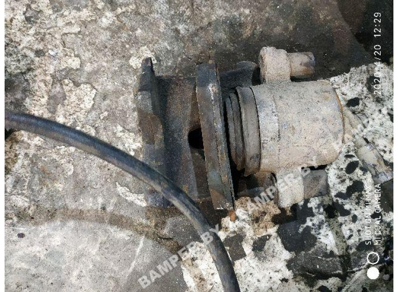 Суппорт передний правый к Skoda Octavia