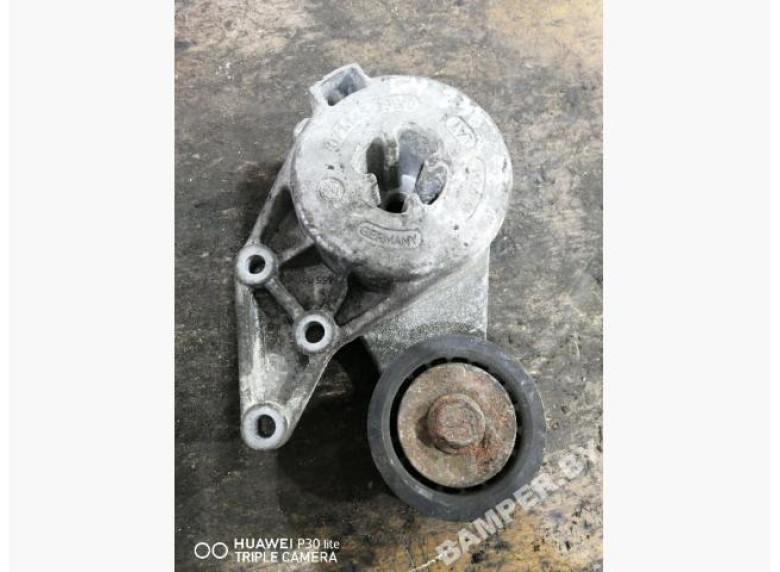 Натяжитель ремня генератора к Volkswagen Golf, 2000г.