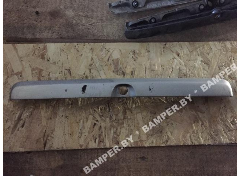 Накладка подсветки номера к Opel Astra, 2000г.