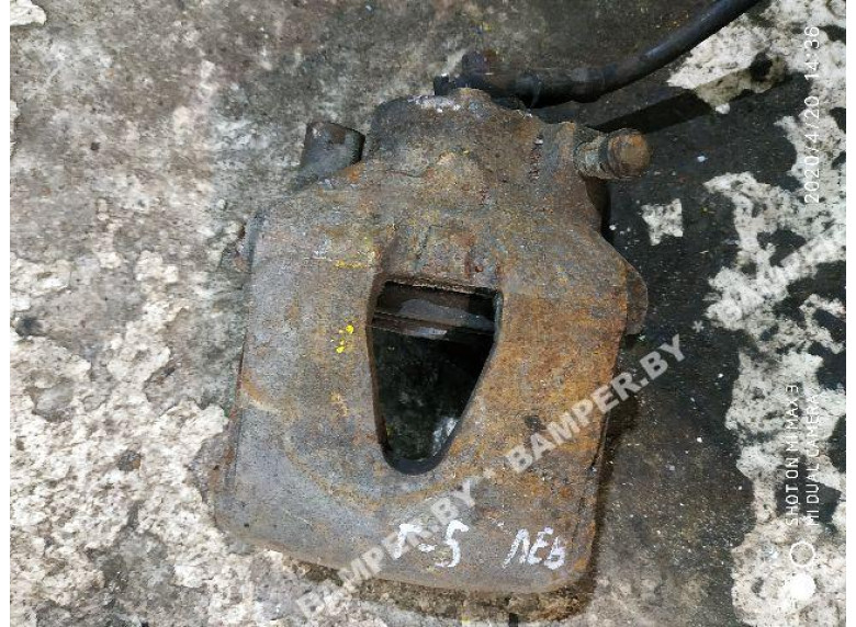 Суппорт передний левый к Skoda Octavia, 1999г.