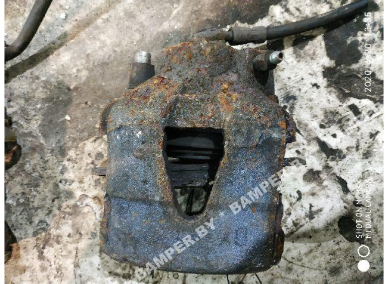 Суппорт передний левый к Volkswagen Golf, 1999г.