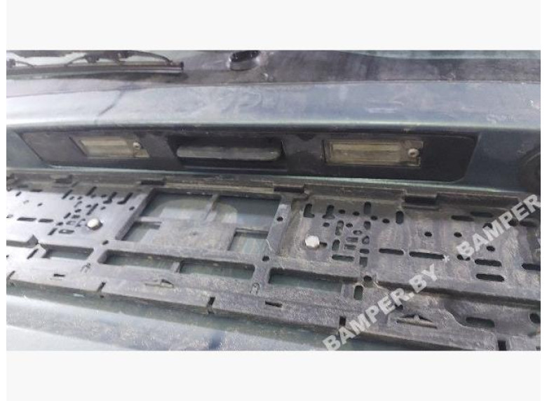 Накладка подсветки номера к Volvo XC70, 2001г.