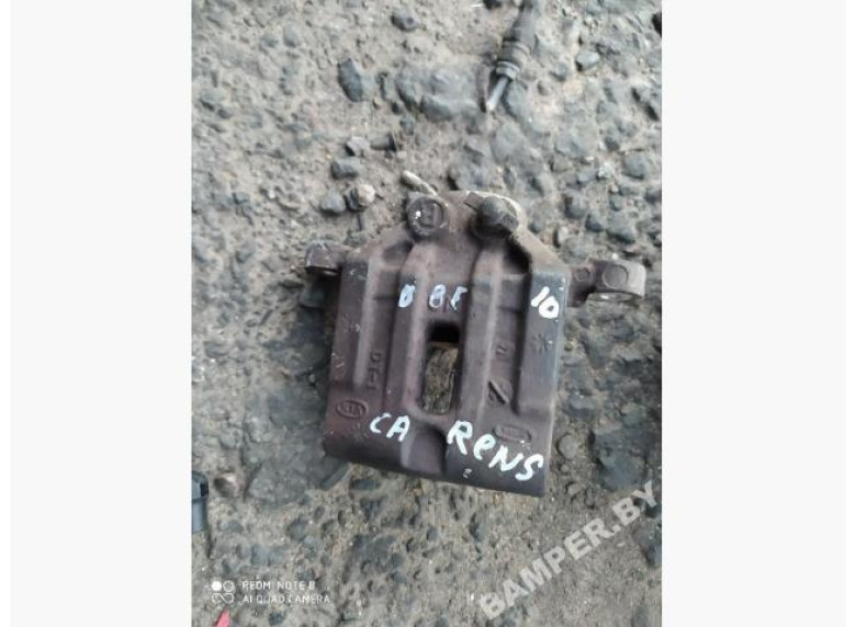 Суппорт задний правый к Kia Carens