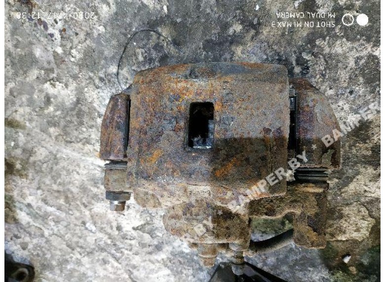 Суппорт передний правый к Mitsubishi Lancer