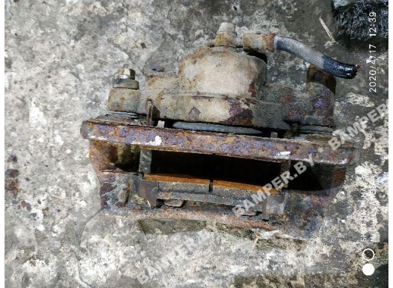 Суппорт передний правый к Mitsubishi Lancer