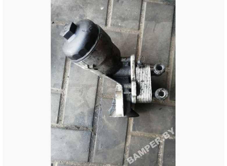 Теплообменник масляного фильтра к Opel Astra, 2003г.