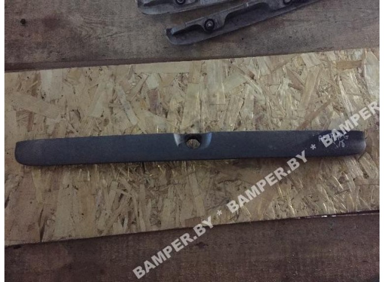 Накладка подсветки номера к Opel Astra