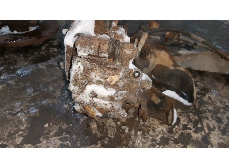 Суппорт задний левый к Kia Rio