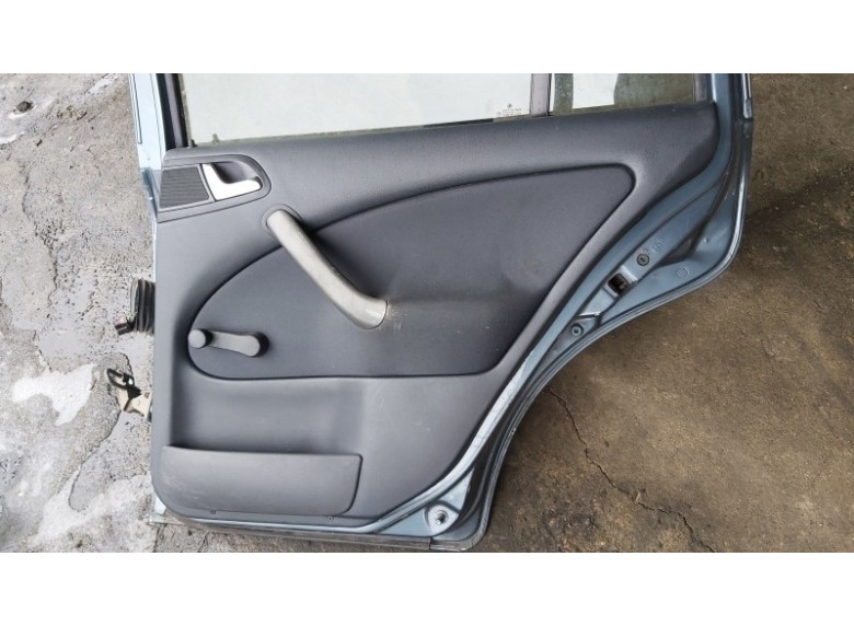 Обшивка двери задней правой (дверная карта) к Skoda Octavia