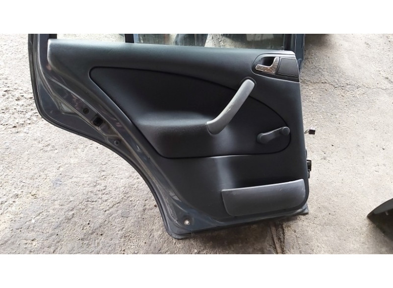 Обшивка двери задней левой (дверная карта) к Skoda Octavia