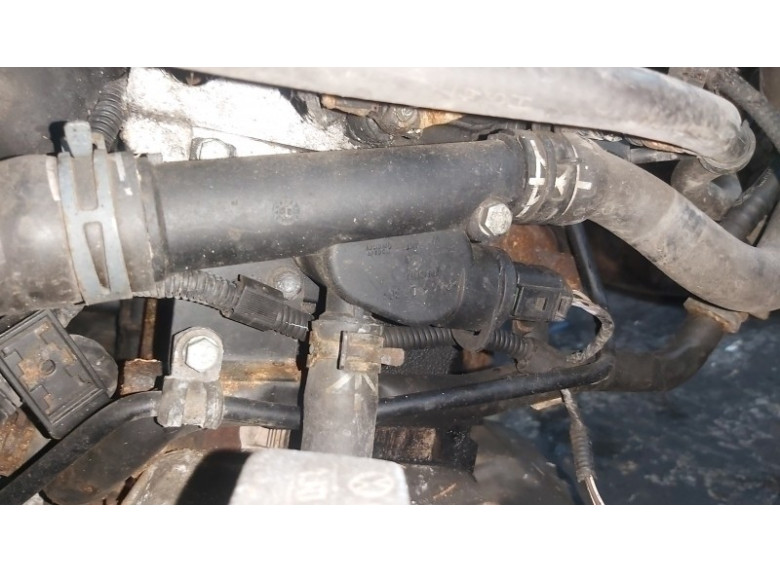 Фланец (тройник) системы охлаждения к Skoda Octavia