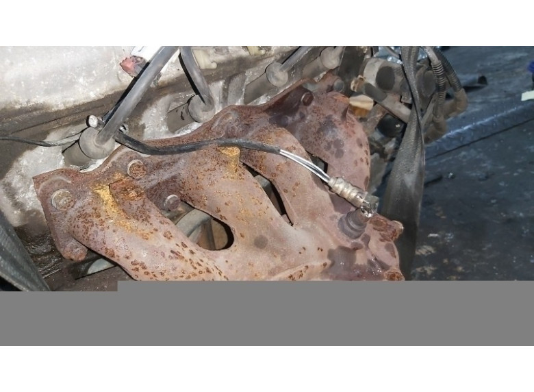 Коллектор выпускной к Mazda 323, 2002г.