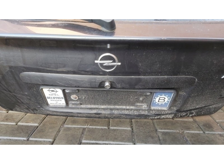 Накладка подсветки номера к Opel Astra, 1998г.