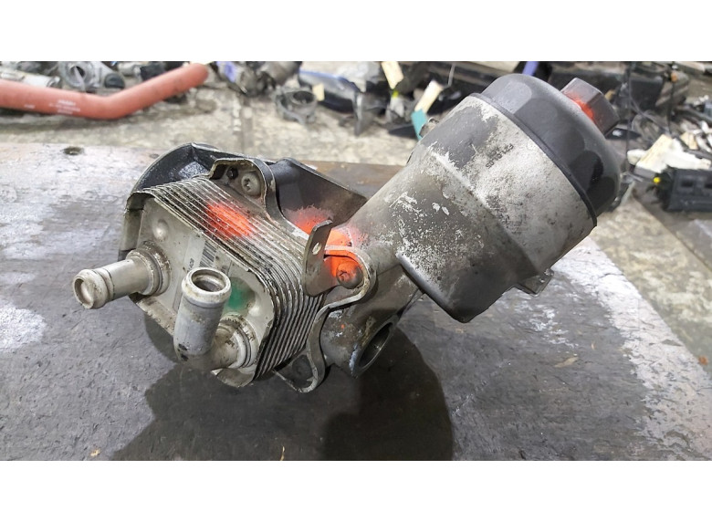 Теплообменник масляного фильтра к Opel Astra, 2001г.