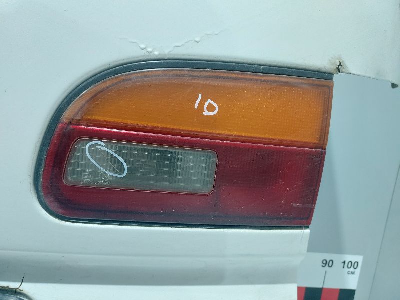 Фонарь крышки багажника - Mitsubishi L400