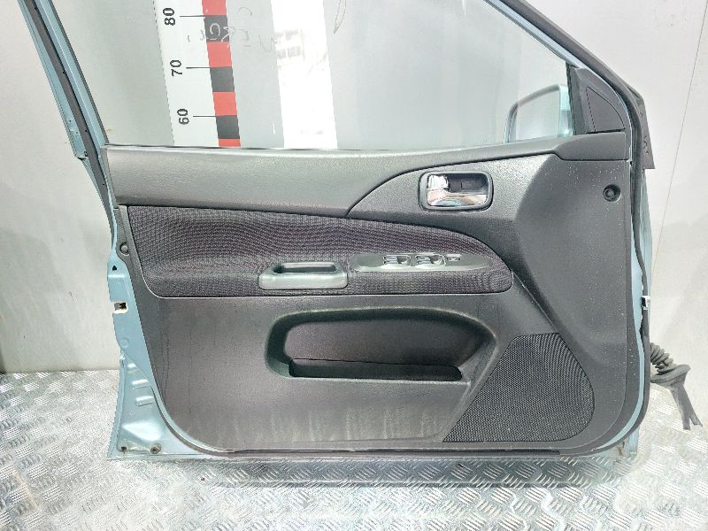 Обшивка двери (дверная карта) - Mitsubishi Lancer 9 (2003-2009)